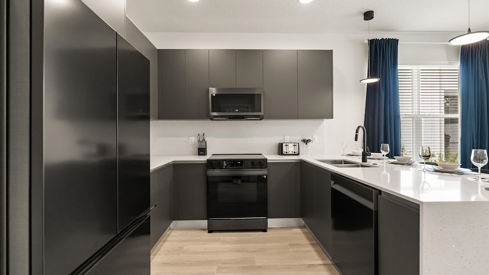 Contemporary 4BR Townhome With Pool Themed Rooms