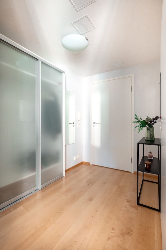 2ndhomes Stylish 1BR Apt w Sauna&Balcony view 3