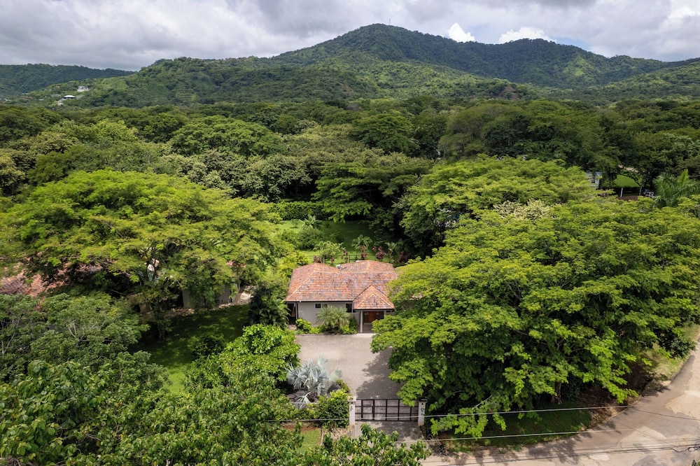 Beautiful home in a gated Neighborhood, Walking Distance to Beach with Garden