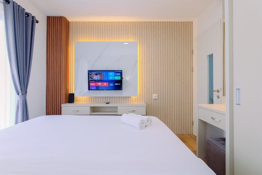 Restful and Modern 2BR at Sentul Tower Apartment