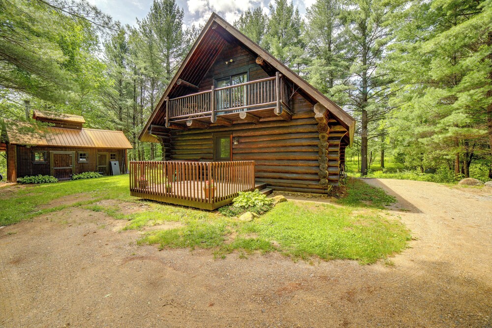 Secluded Log Cabin in NW Michigan: Hot Tub Deck - Property Image 3