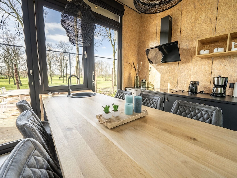 Modern Chalet by the River Maas