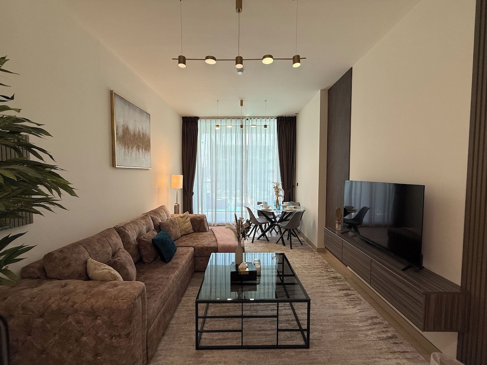 Manzil-1BR in JVC with Pool View