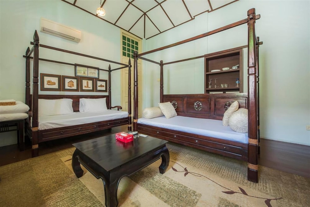 PalanquInn Heritage Suites