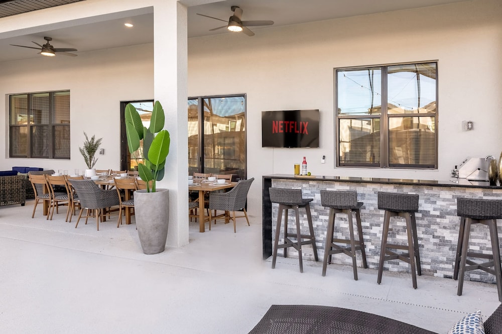 Spacious Oasis for Your Big Crew Games Pool BBQ