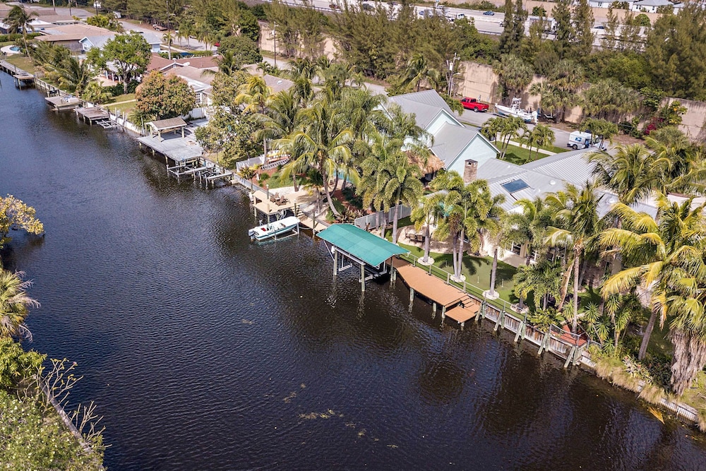 Sunny Waterfront Home by West Palm w/ Hot Tub! view 5