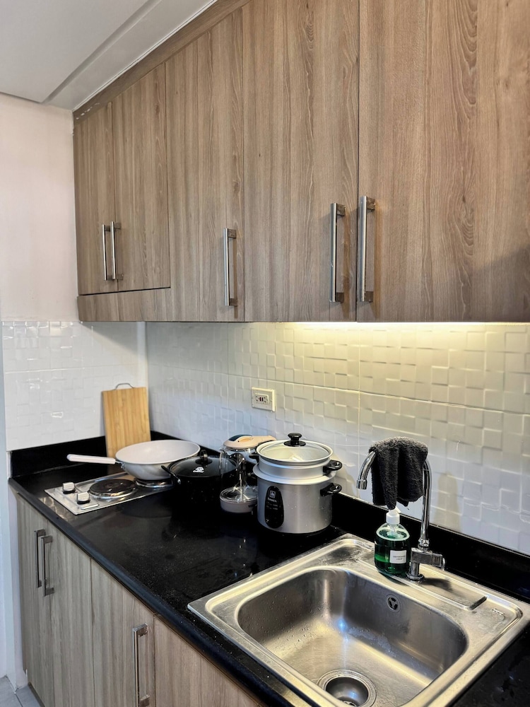 Relax in Pasay City's Best Kept Secret - Spacious Condo With Garden View