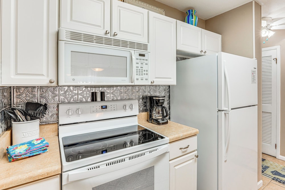 Walk to Beach: PCB Gem w/ Community Pool Access!