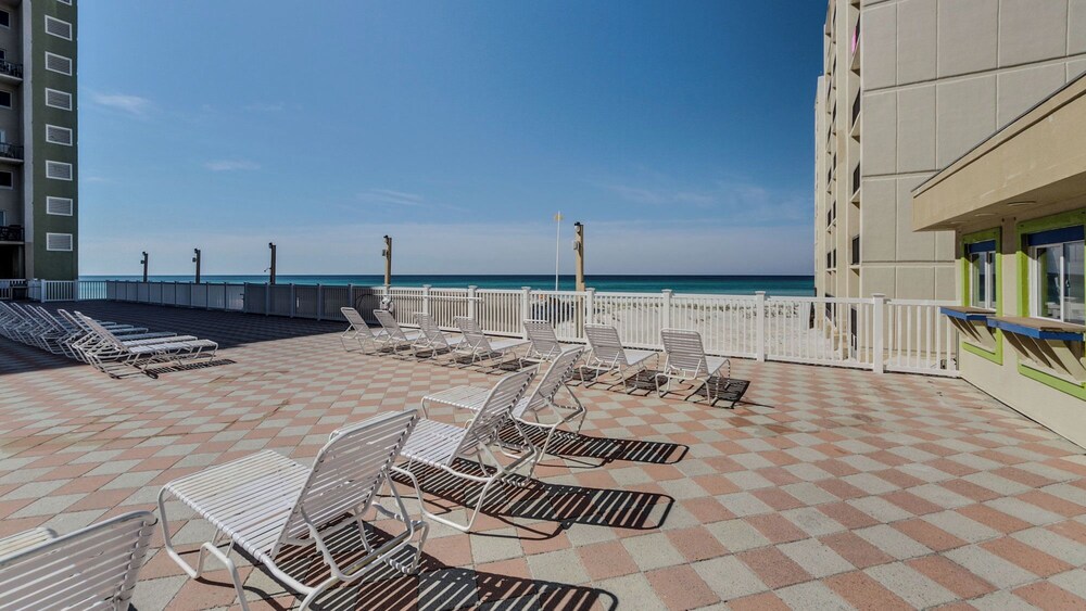 Beachfront Charm Meets Lake Life + Free Tickets: Dolphin Cruise & More!