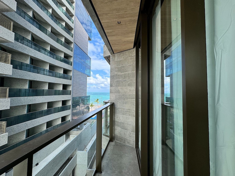 NWTs - Estúdios com Vista Lateral Mar