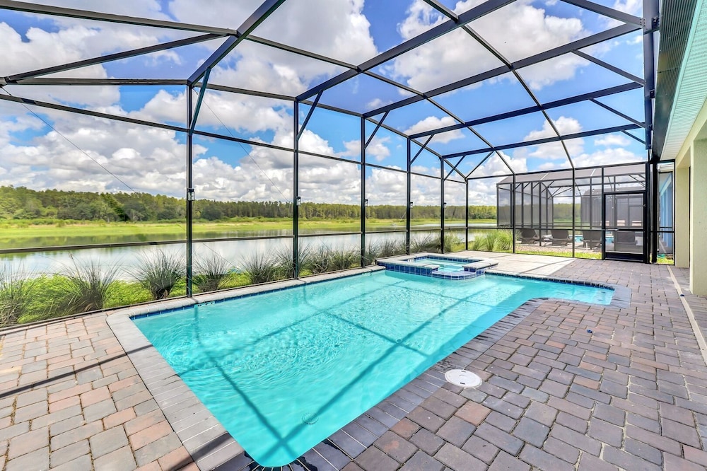 Serenity Lakeview Retreat Stunning Water Views, No Rear Neighbors, Private Pool, Game Room & Star Wars Cinema