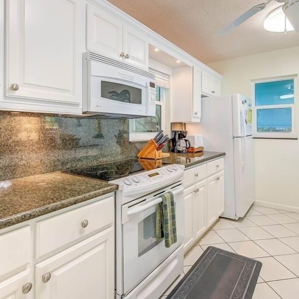 Complete Duplex On Gated Bayfront Property 4 Bedroom Apts by RedAwning