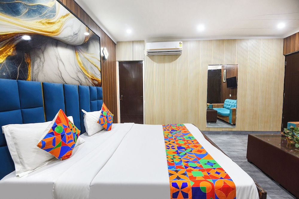 Fabhotel Happy Residency