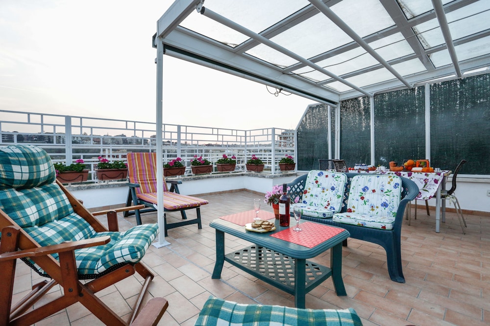 Enjoy the Sunset on Your Vatican Terrace