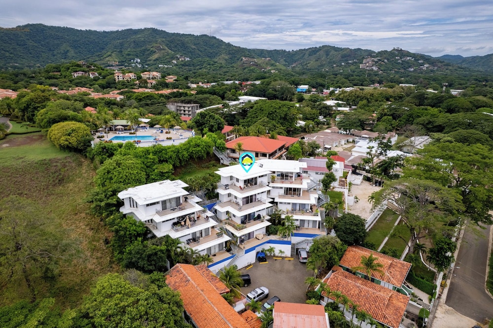 Modern Top-Floor Condo with Panoramic Views and Community Pool