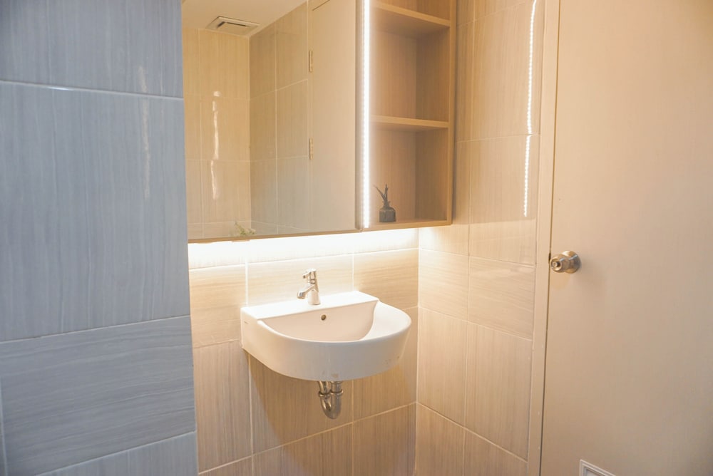High Floor 1BR at Vasanta Innopark Apartment near MM2100 and Cibitung