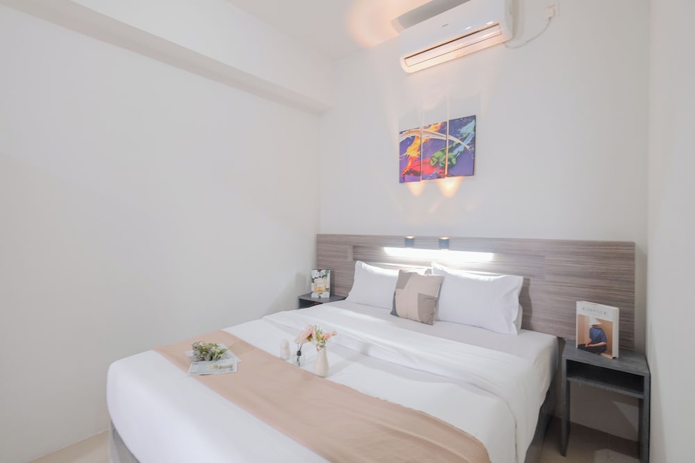 Warm and Spacious 2BR Apartment at Vittoria Residence
