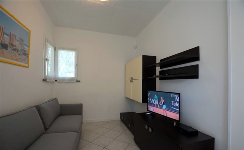 Semi Detached Villa With Private Fenced Garden in Lignano Pineta