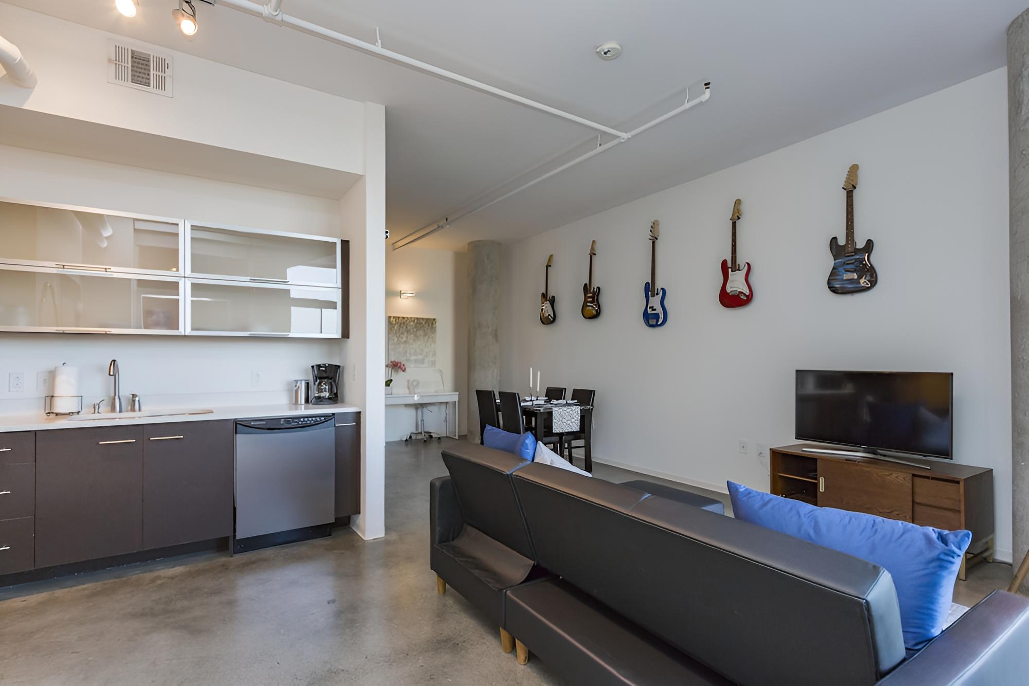 Industrial Chic Condo with Balcony view 5