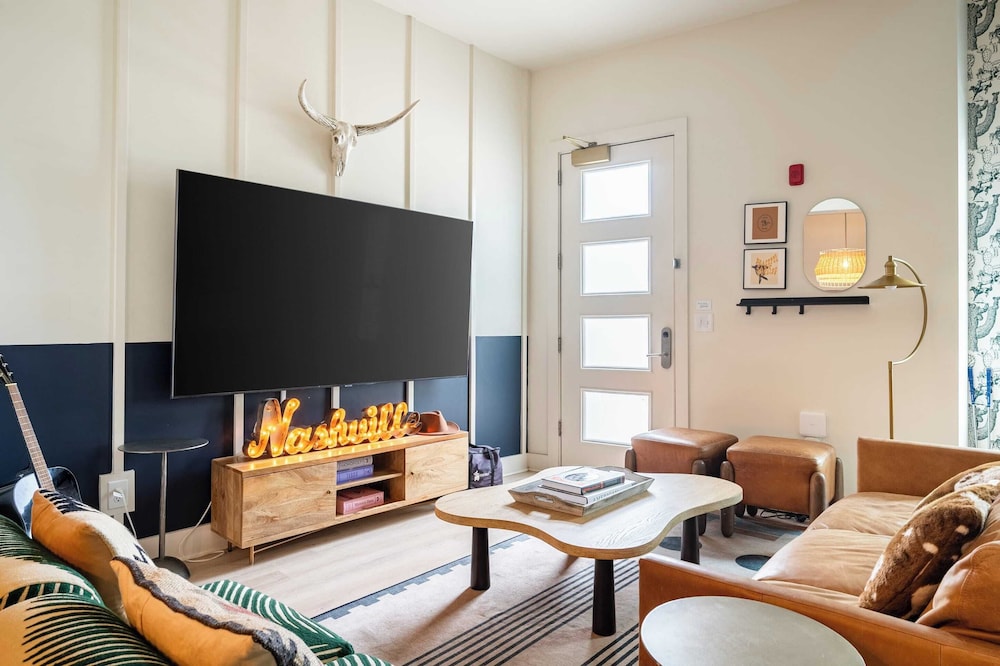 Sleeps 24 Rooftop, Game Room & Outdoor Spaces Just 10 Min to Broadway Outrider by Avantstay