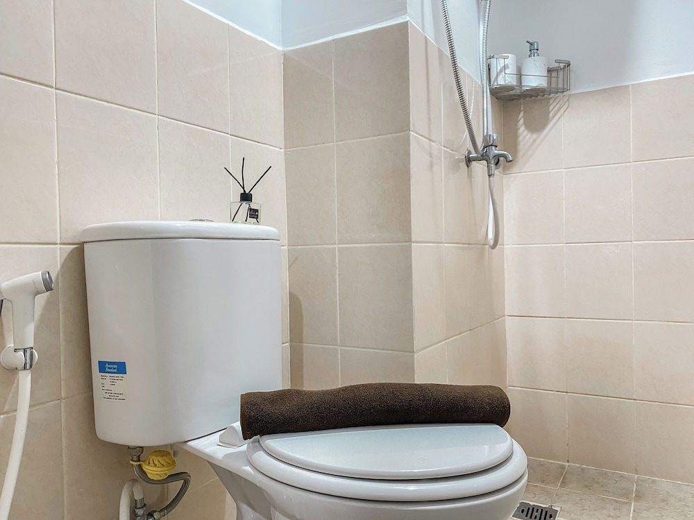 Warm and Homey Studio at Podomoro Golf View Apartment