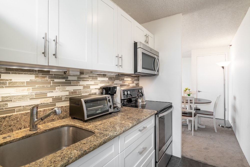 Waikiki Banyan Condo Located One Block From Waikiki Beach! by Koko Resort Vacation Rentals