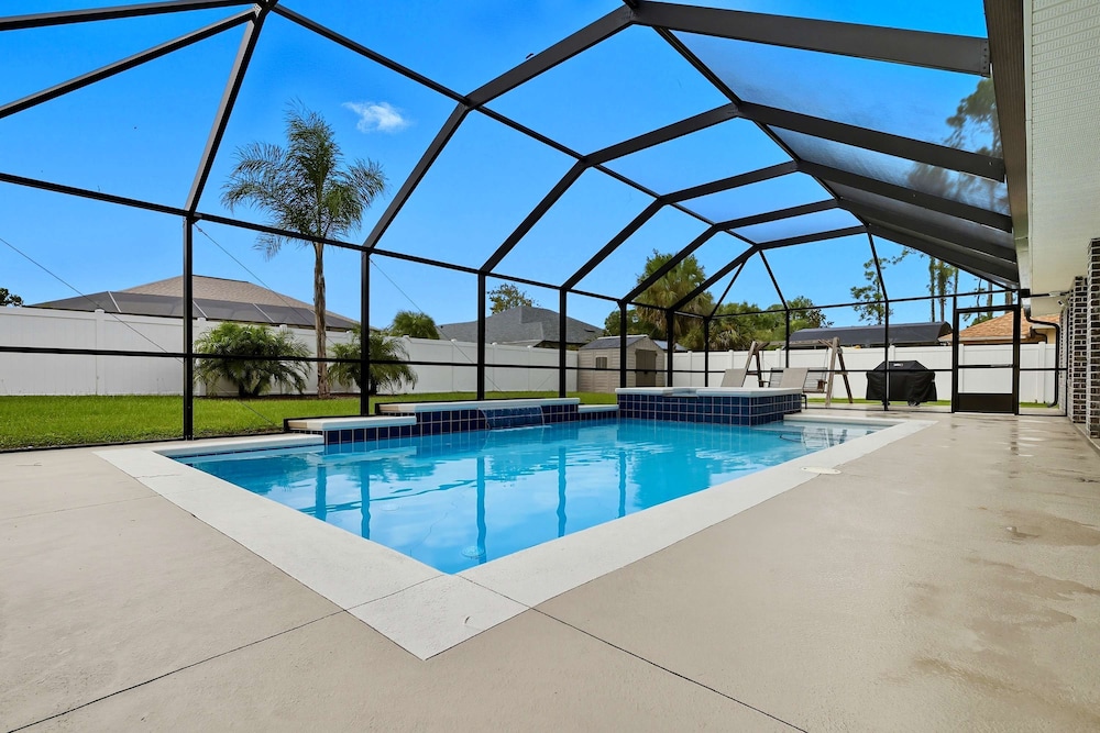 Modern 4BR Retreat Near Beach Heated Pool