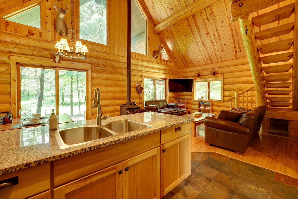 Secluded Log Cabin in NW Michigan: Hot Tub Deck - Property Image 24