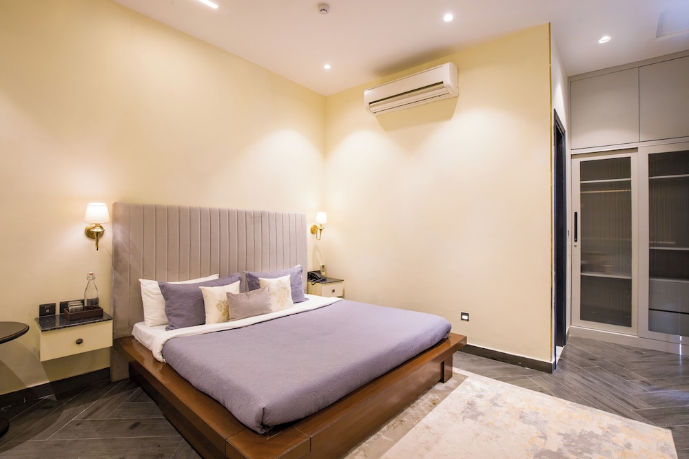 ELIVAAS Ibiza Luxe 4-BHK Farmhouse