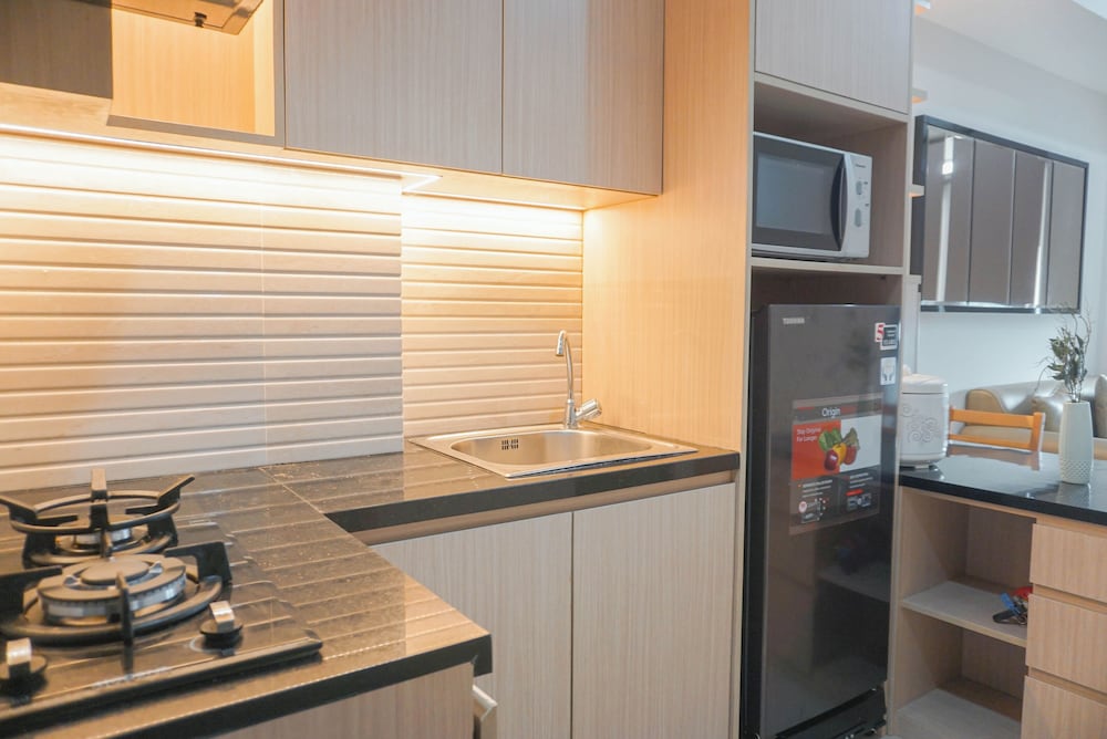 High Floor 1BR at Vasanta Innopark Apartment near MM2100 and Cibitung