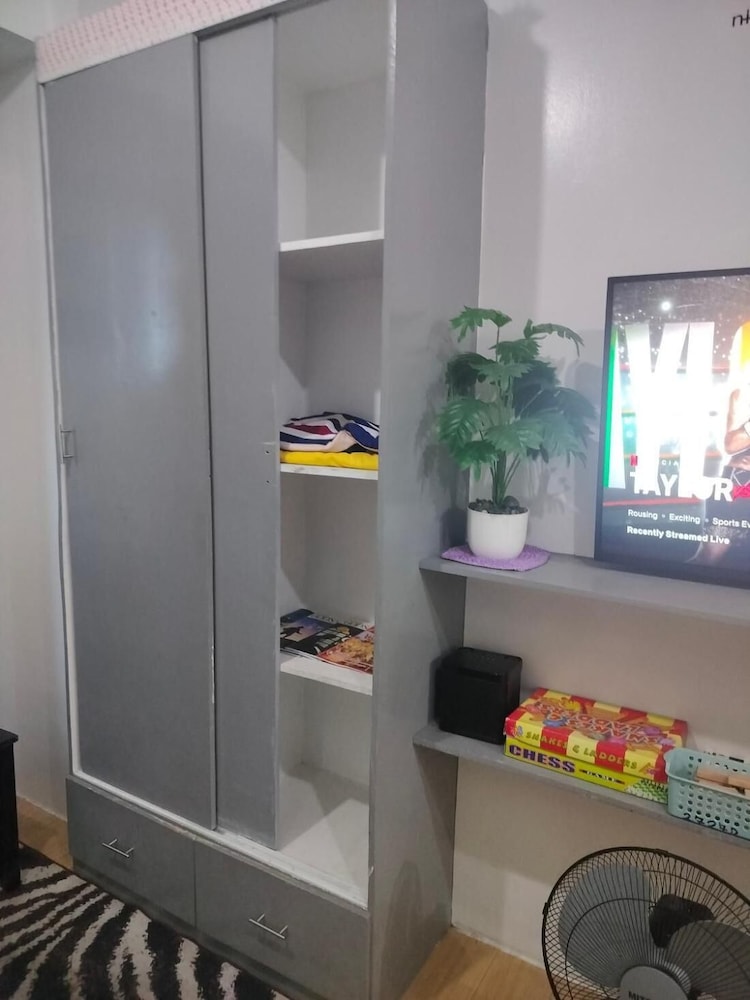 Cozy City View Condo in Quezon City - Your Home Away From Home