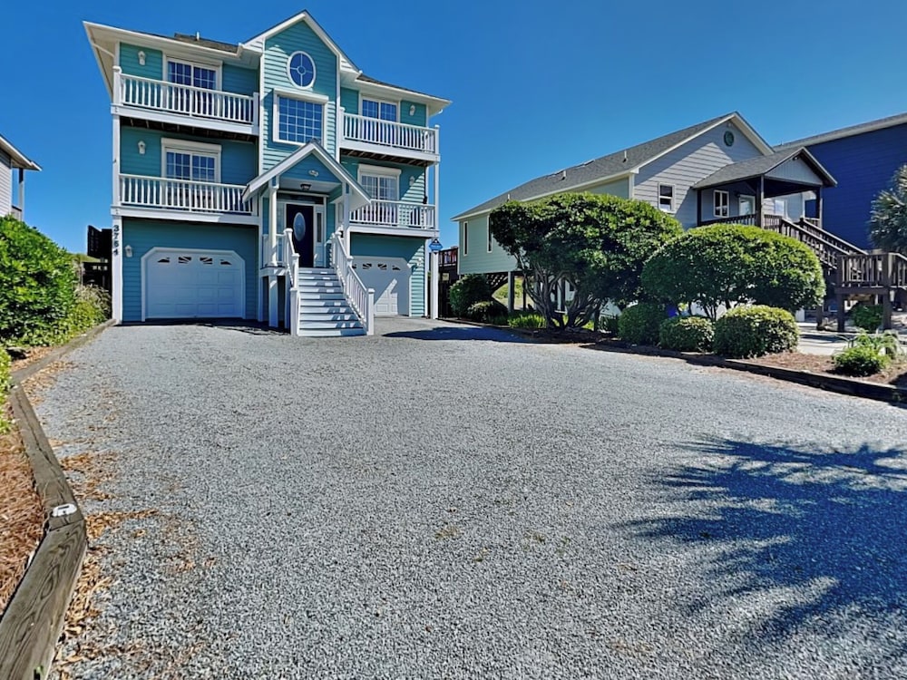 Blue Me A Wave by Topsail Realty