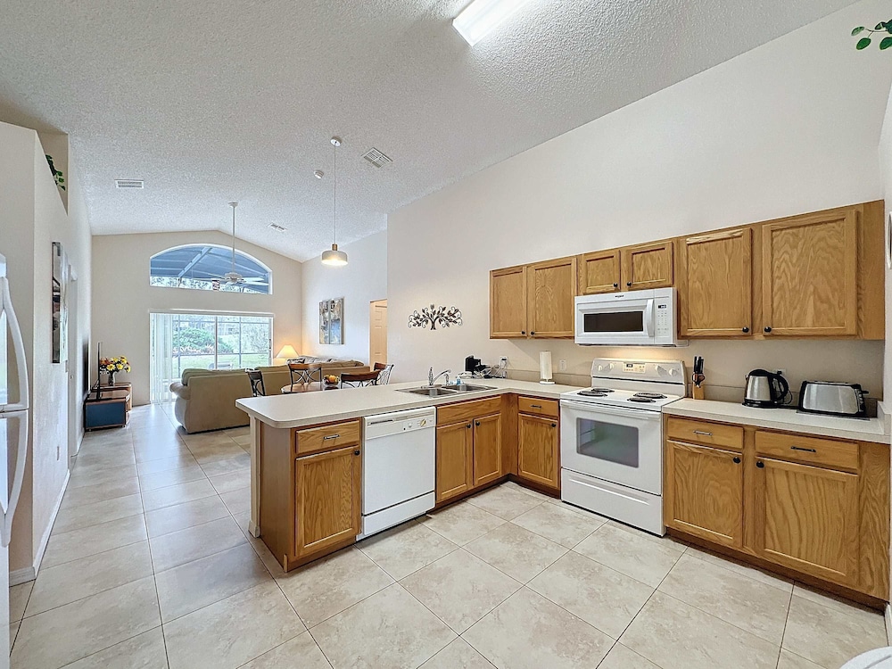 South Facing Pool Home With Golf Course Views