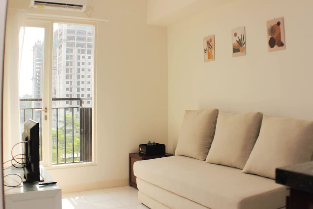 Nice and Comfort 1BR with Extra Room at Podomoro Golf View Apartment