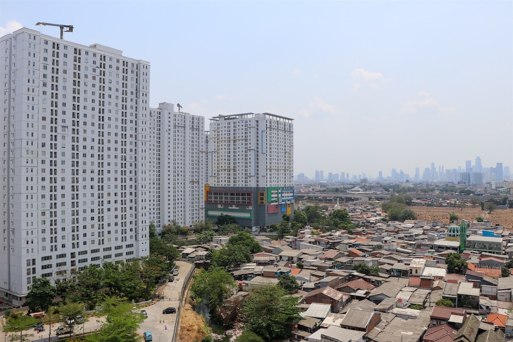 Homey And Strategic 2Br At Bassura City Apartment