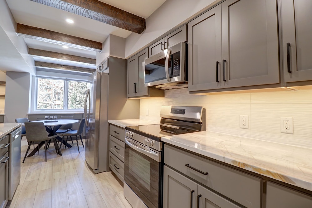 Peaceful Forested Location Next to River, Ski-In Ski-Out Located in Center Village - LD102 by Redawning