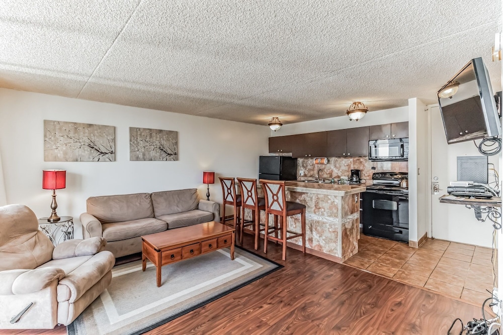 Waikiki Banyan Condo Located One Block From Waikiki Beach! by Koko Resort Vacation Rentals