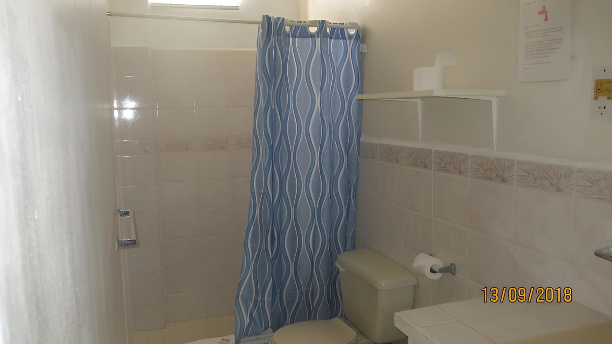 Tropical Breeze Guesthouse and Furnished Apartments