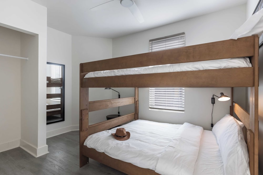 Sleeps 24 Rooftop, Game Room & Outdoor Spaces Just 10 Min to Broadway Outrider by Avantstay