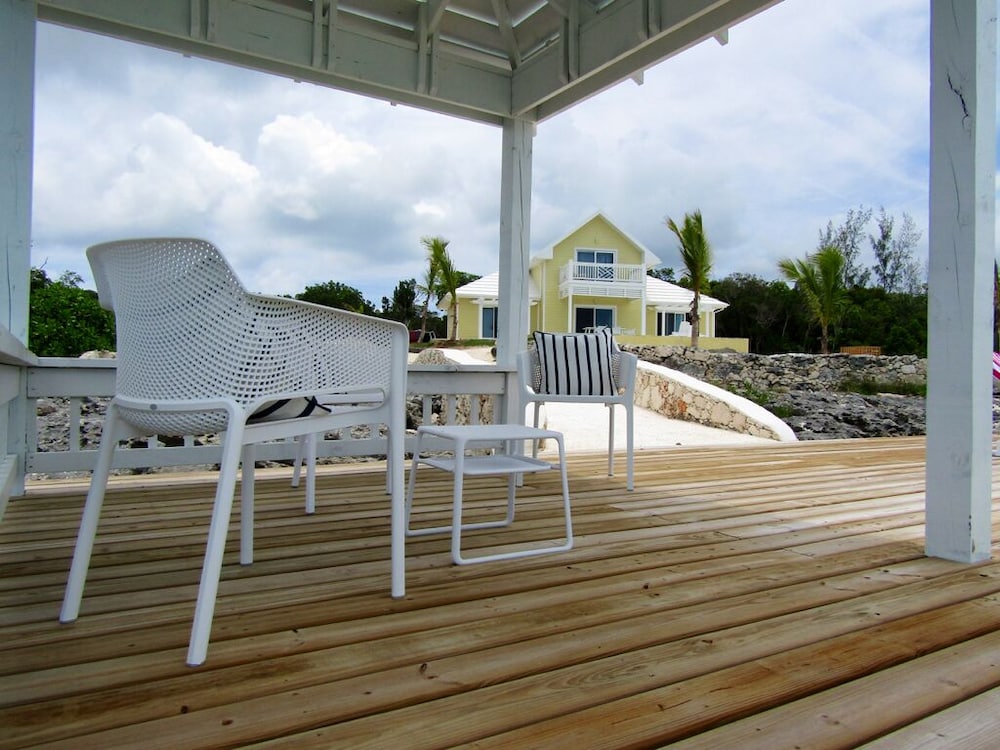 Oceanfront Haven: Elegant Estate With Private Deck