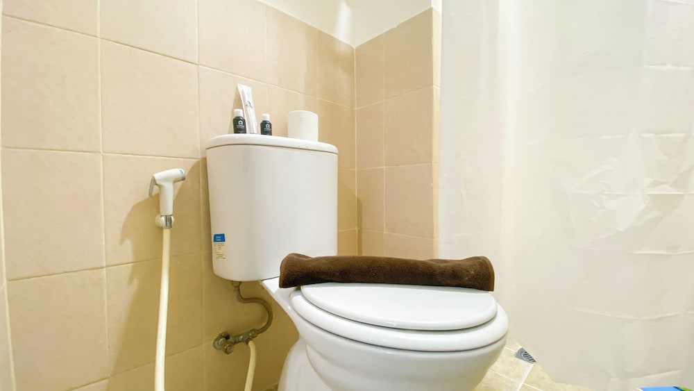 Tranquil and Homey Studio at Podomoro Golf View Apartment
