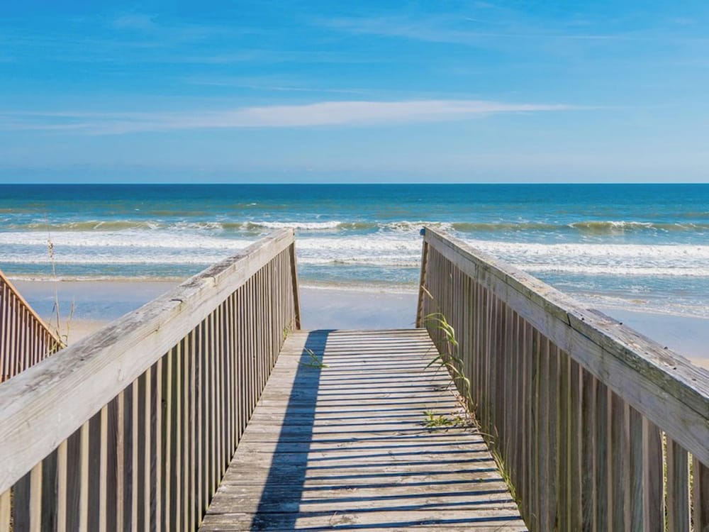 Song Of The Sea by Topsail Realty