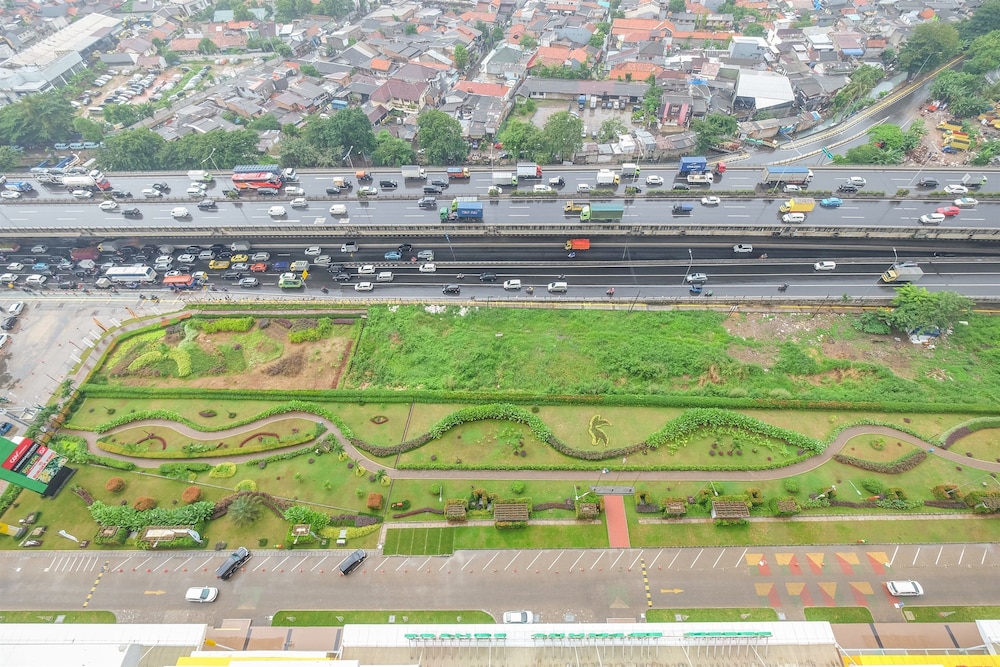 2 Bedrooms at Green Pramuka City Apartment By Travelio