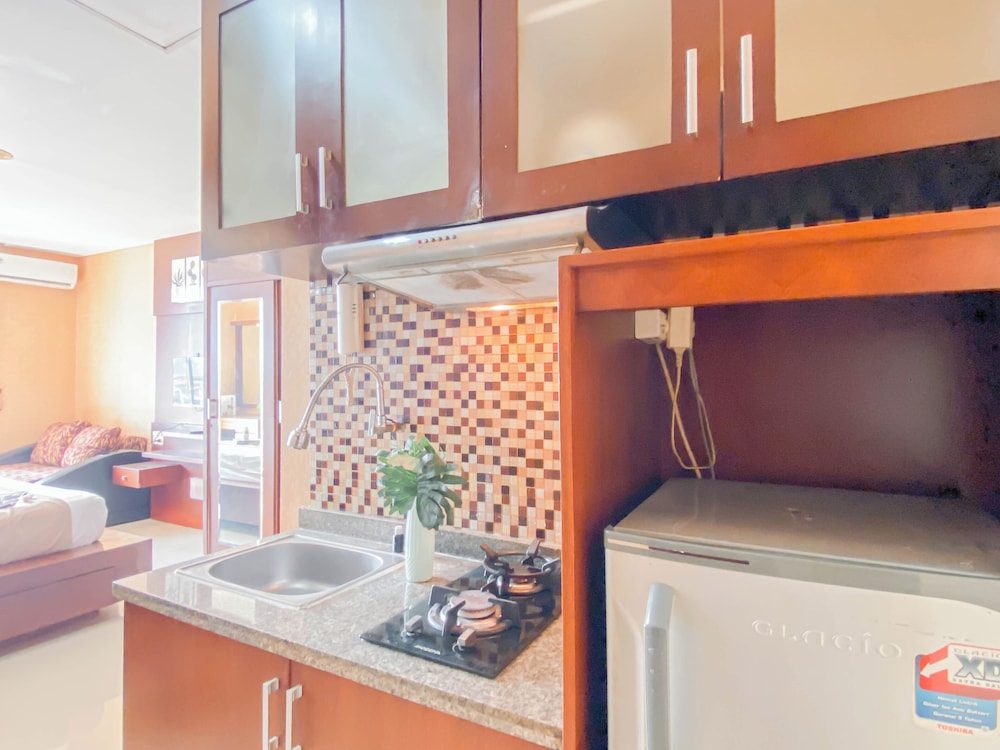 Warm Wood Accents Studio At Mangga Dua Apartment