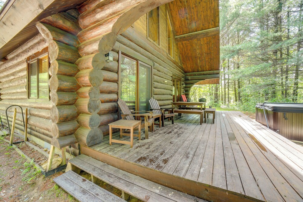 Secluded Log Cabin in NW Michigan: Hot Tub Deck - Property Image 5