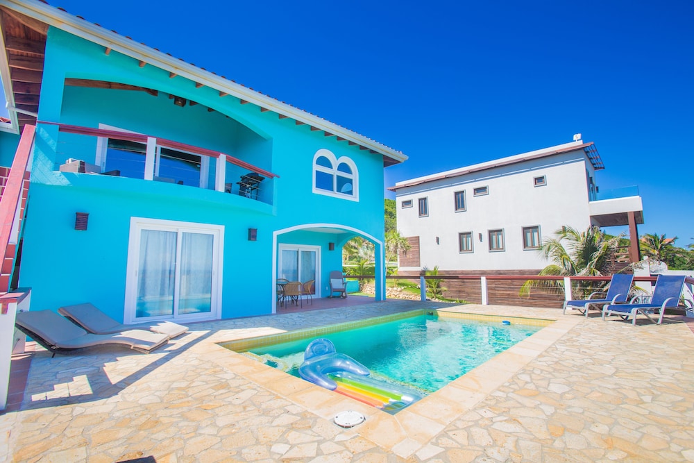 Stunning Coral View Home with Oceanfront Pool by RedAwning