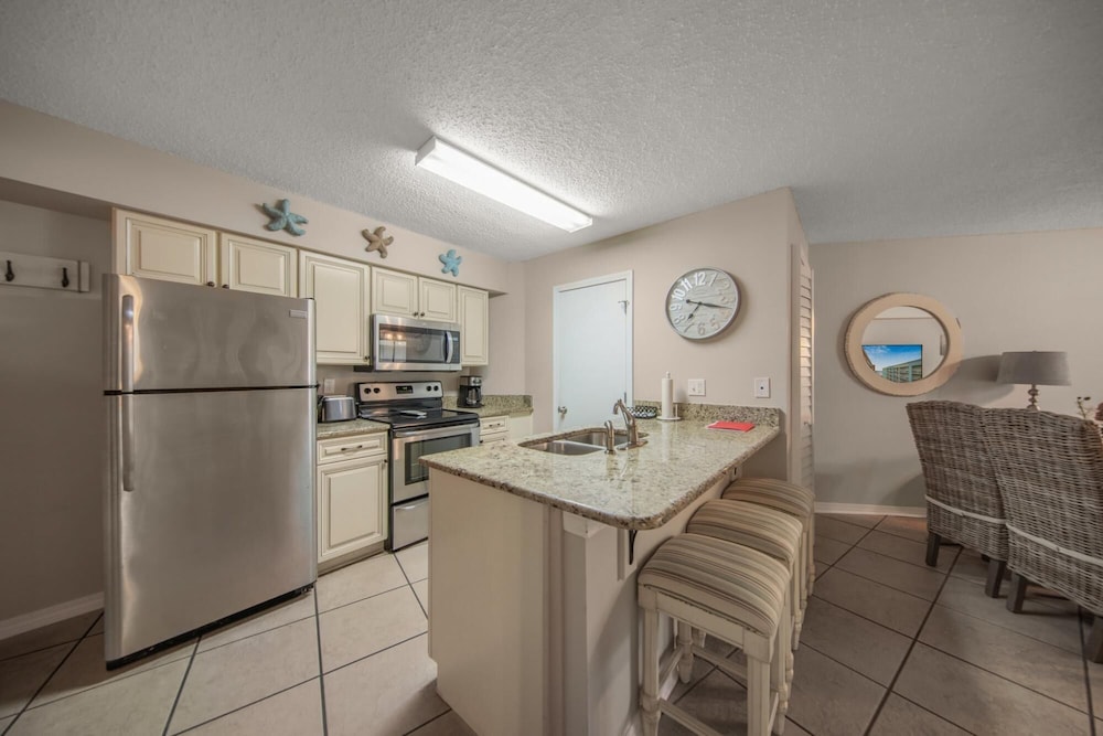 Charming Condo on Beach Indoor Outdoor Pool view 3