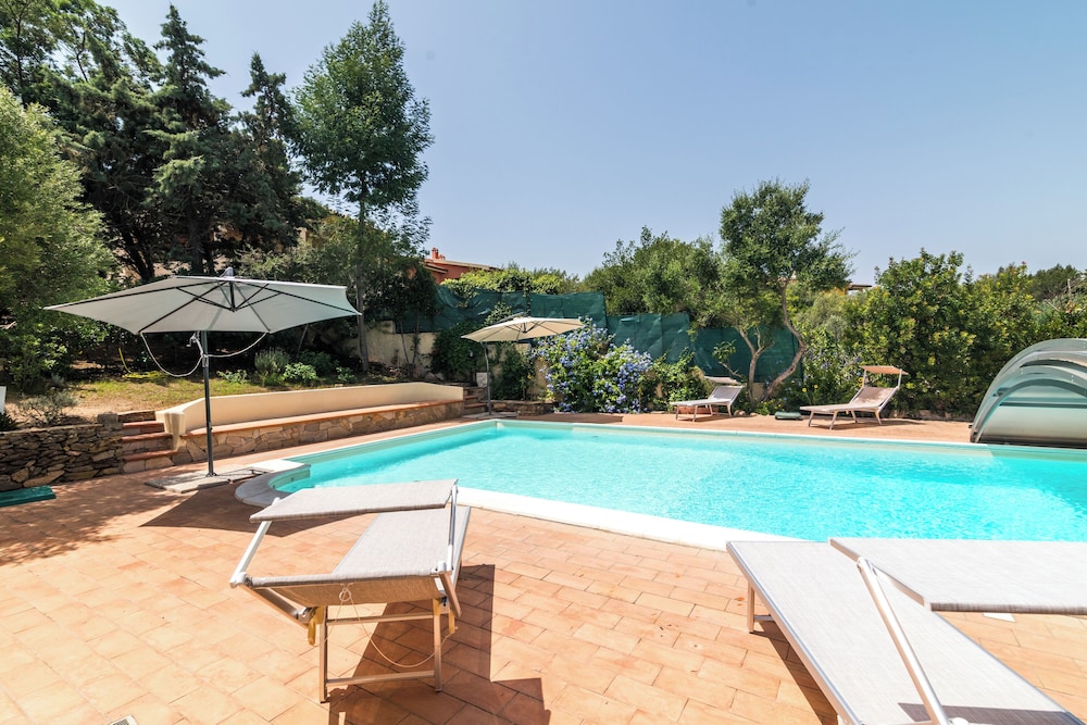 Appartamento Est With Shared Pool en San Teodoro — recepcion & lobby