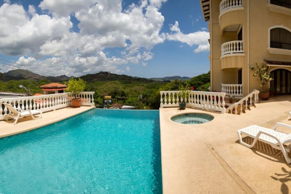 Birds-eye view of the ocean in nicely priced unit on top floor in Flamingo view 5