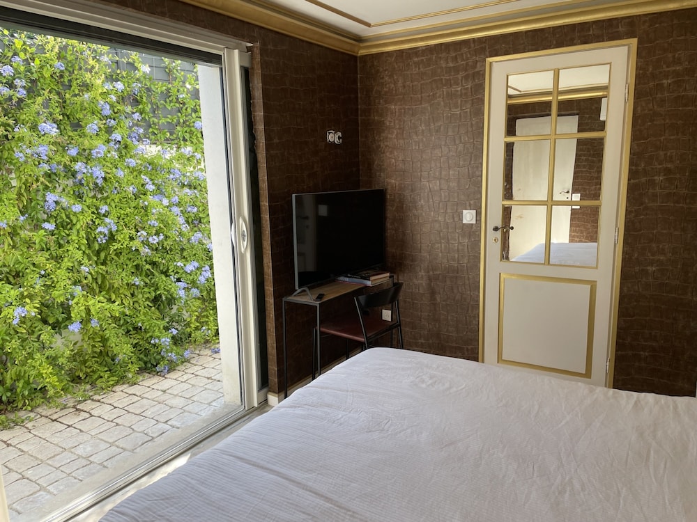 Chambre Luxe Piscine Jardin vue Solarium Palmeraie